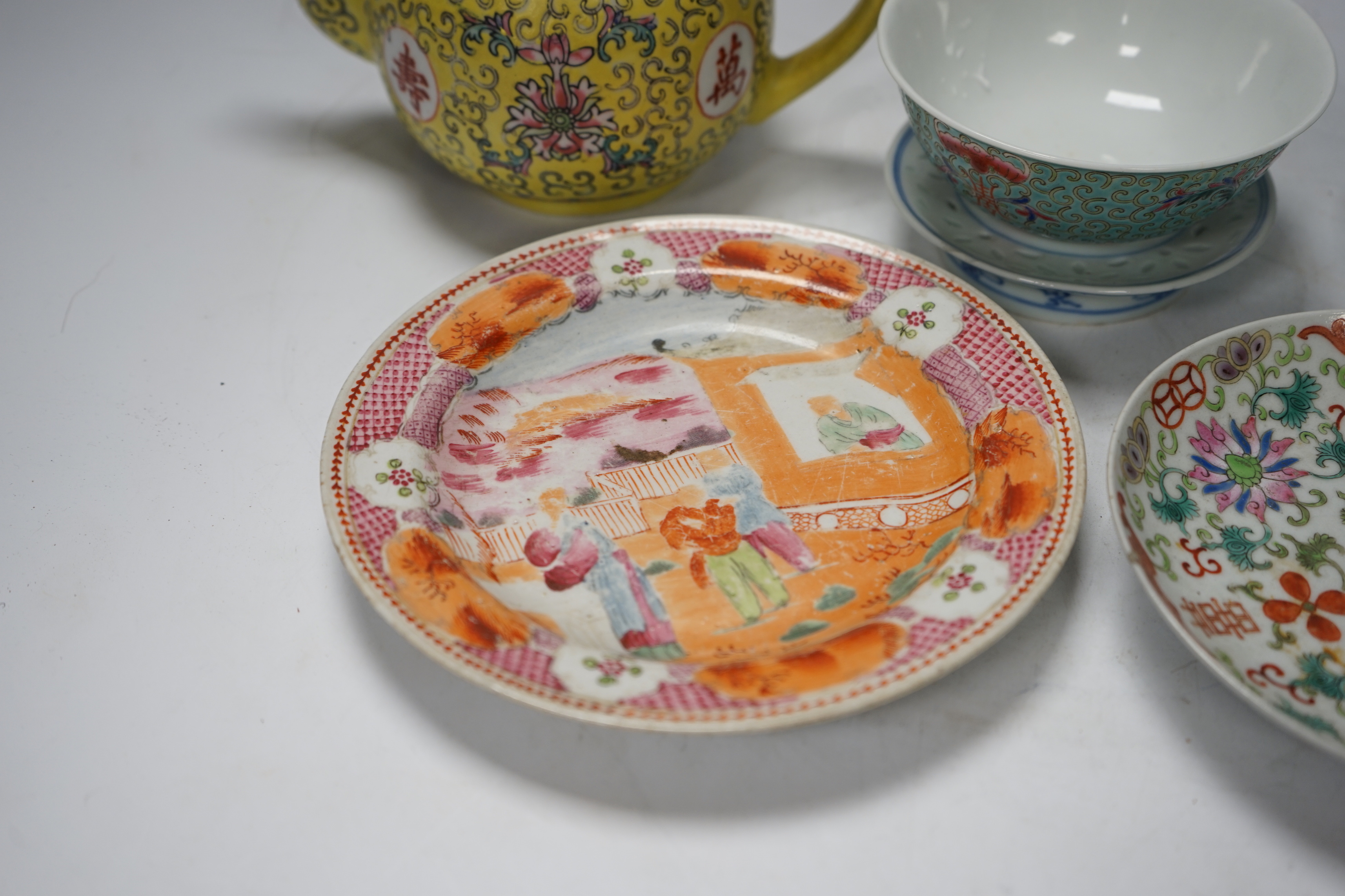 Six Chinese ceramic items; a teapot, two bowls and three small dishes, teapot 10cm